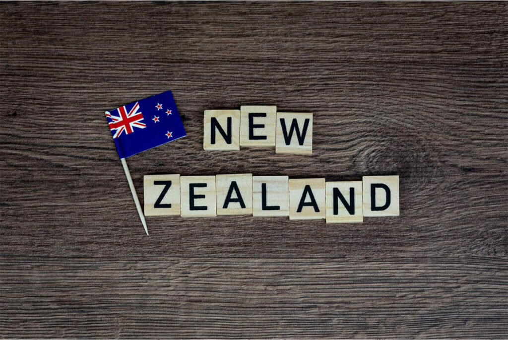 New Zealand Flag with New Zealand wooden letter sign
