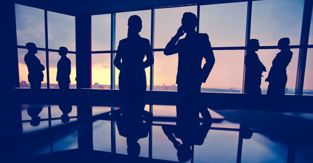 silhouettes of business people