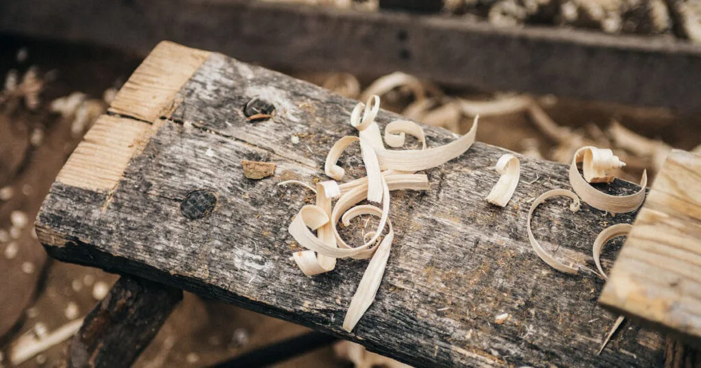 Scraped wood by a carpenter of a recruitment agency for New Zealand