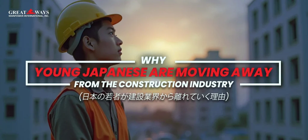 young japanese worker looking at the sky while standing at the tall building in Japan